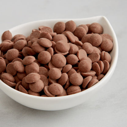 Callebaut Recipe 823 Milk Chocolate Callets™ 22 lb. - 2/Case