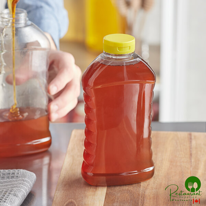 22 oz. (32 oz. Honey Weight) Ribbed Hourglass PET Honey Bottle with Pressure Sensitive Liner Yellow Plastic Flip Top Lid - 159/Case